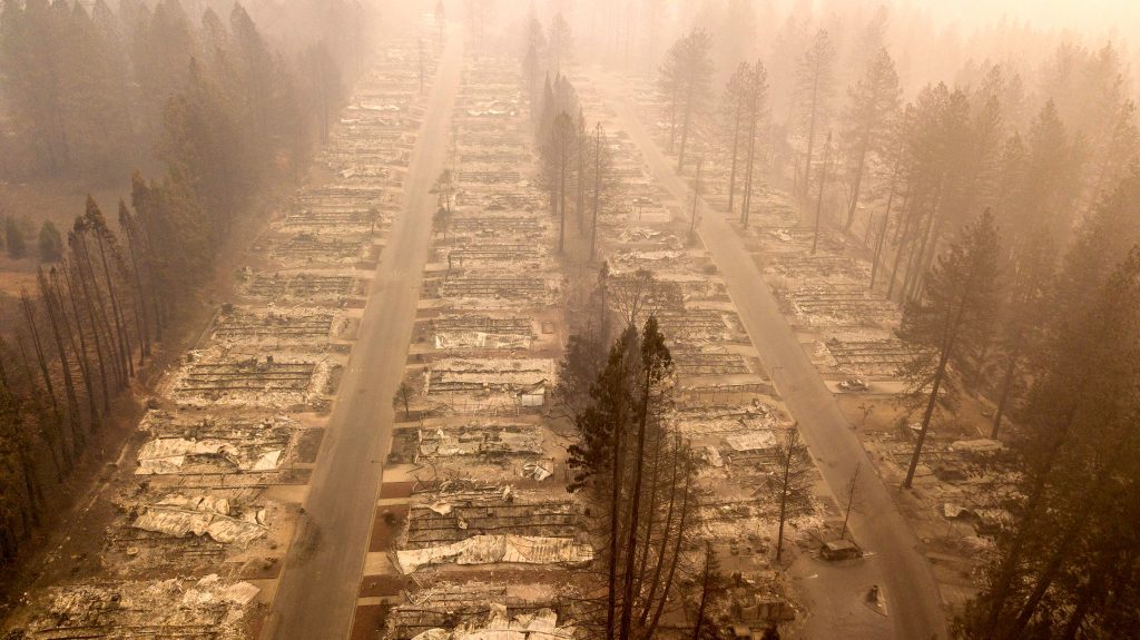 In this aerial photo, a burned neighborhood is seen in Paradise, California on November 15, 2018. - The toll in the deadliest wildfires in recent California history climbed to 59 on November 14, 2018, as authorities released a list of 130 people still missing. 